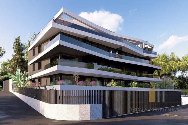 Роскошная двухкомнатная квартира в современном новострое в 750 м от пляжа в Примоштене!