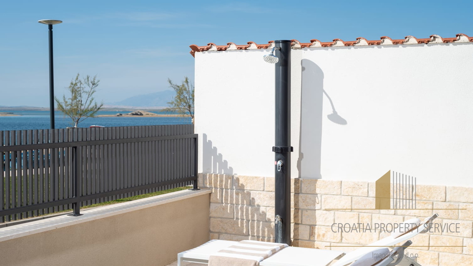 Beautiful new villa in an attractive location, first row to the sea in the center of Nin!