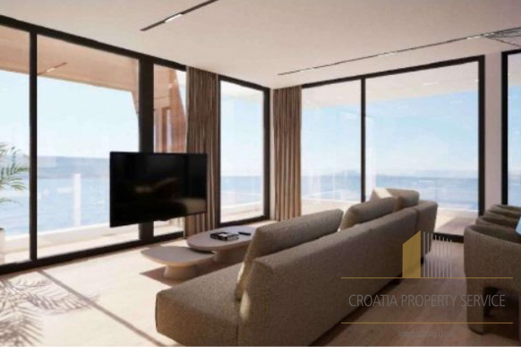 Luxurious penthouse with a rooftop terrace in the first row to the sea – Sukošan!