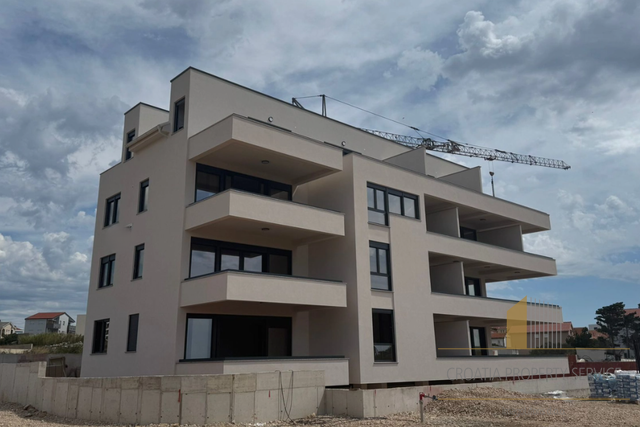 One-bedroom apartment in a modern new building 350 meters from the sea in Povljana, Pag Island!