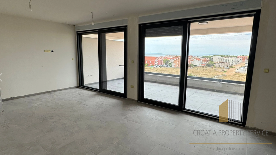 One-bedroom apartment in a modern new building 350 meters from the sea in Povljana, Pag Island!