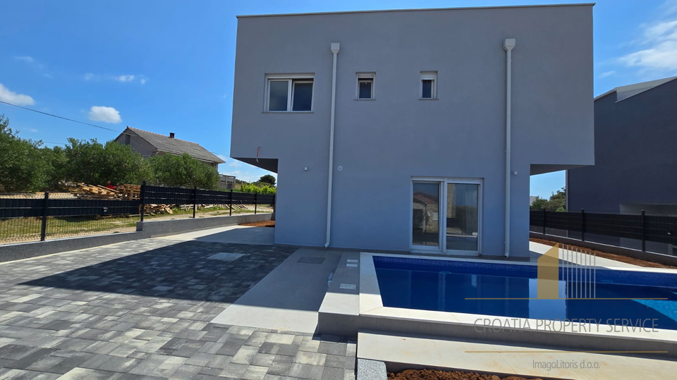 New modern villa with a swimming pool and sea view on the island of Vir!