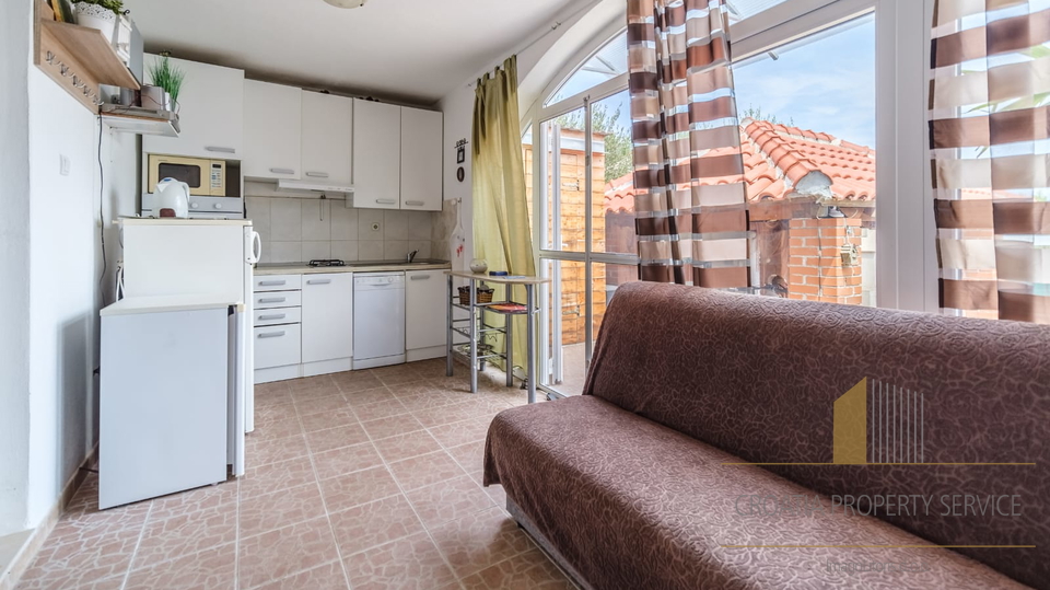 House with high tourist potential in a quiet bay, Milna – Brač island!