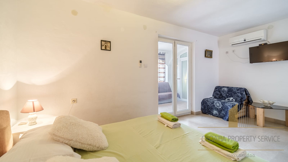 House with high tourist potential in a quiet bay, Milna – Brač island!