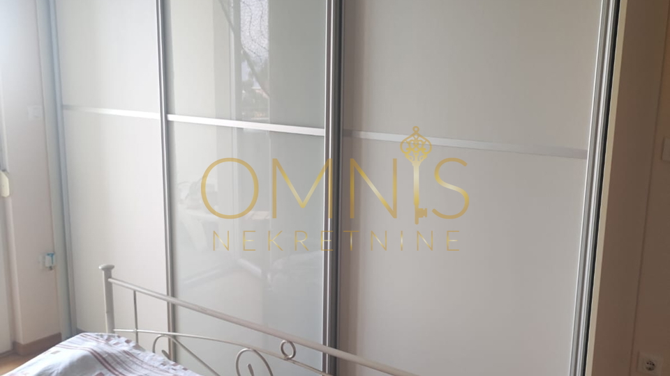 KOSTRENA – SPACIOUS TWO-LEVEL APARTMENT WITH YARD AND PARKING