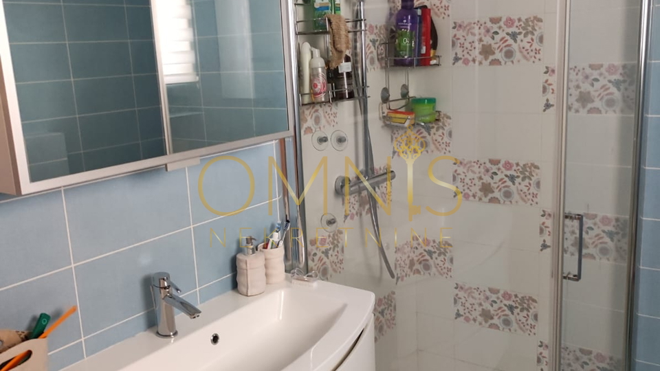 KOSTRENA – SPACIOUS TWO-LEVEL APARTMENT WITH YARD AND PARKING