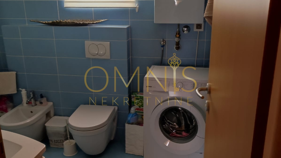 KOSTRENA – SPACIOUS TWO-LEVEL APARTMENT WITH YARD AND PARKING