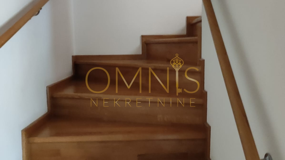 KOSTRENA – SPACIOUS TWO-LEVEL APARTMENT WITH YARD AND PARKING