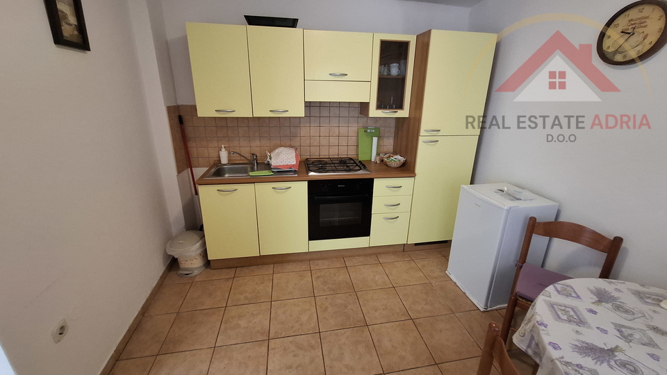FOR SALE: House with three apartments and commercial space in the center of Biograd na Moru, Zadar County, Croatia
