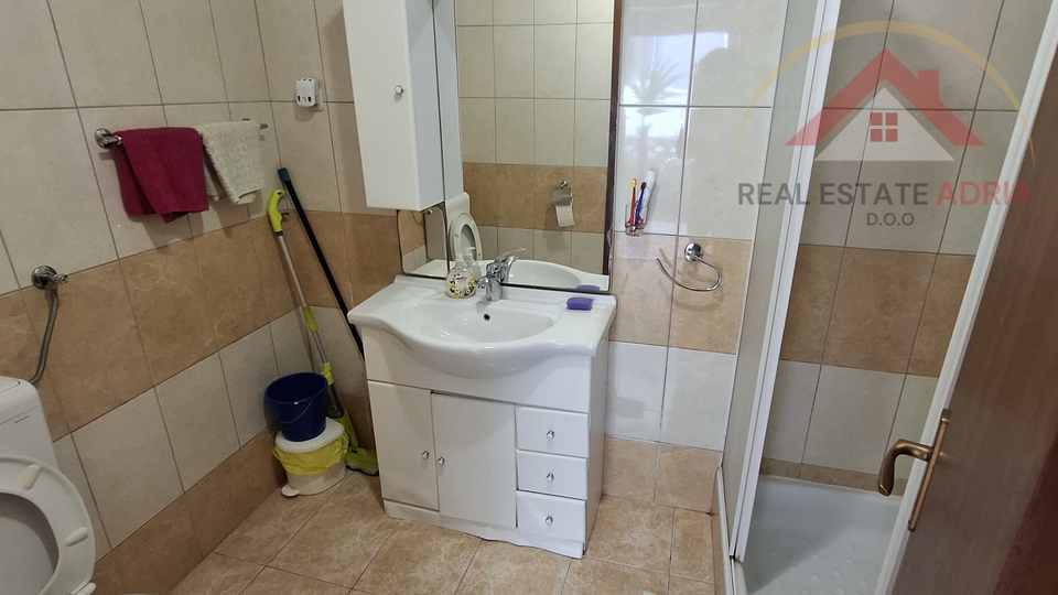 FOR SALE: House with three apartments and commercial space in the center of Biograd na Moru, Zadar County, Croatia