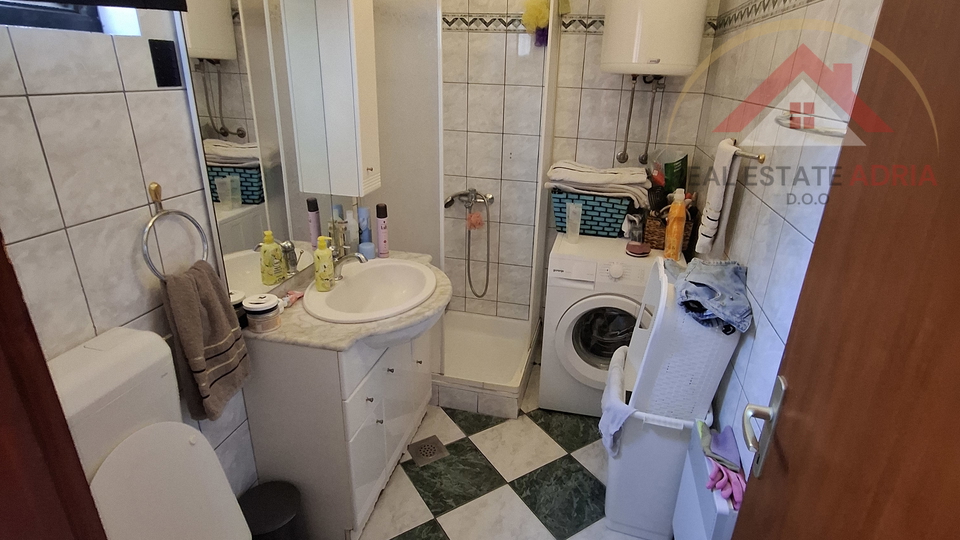 FOR SALE: House with three apartments and commercial space in the center of Biograd na Moru, Zadar County, Croatia
