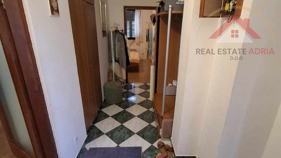 FOR SALE: House with three apartments and commercial space in the center of Biograd na Moru, Zadar County, Croatia