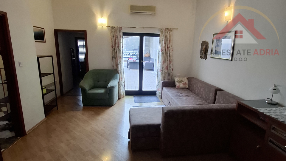 FOR SALE: House with three apartments and commercial space in the center of Biograd na Moru, Zadar County, Croatia