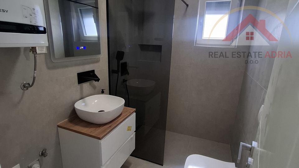Apartment with garden for sale, new building, Turanj, near Zadar, Zadar county