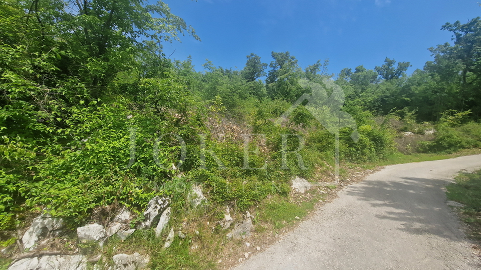 Građevinski teren sa otvorenim pogledom na  Kvarner i Učku