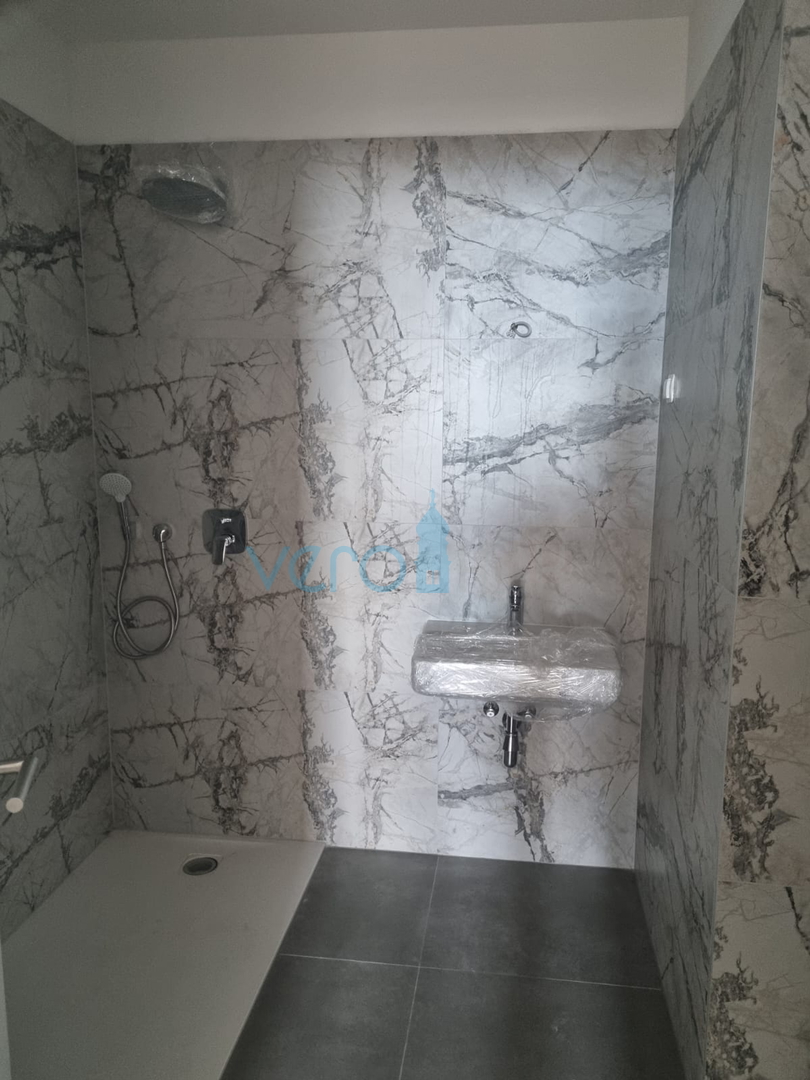 Kostrena, Rijeka area, comfortable three-room apartment, near the sea, ground floor, for sale