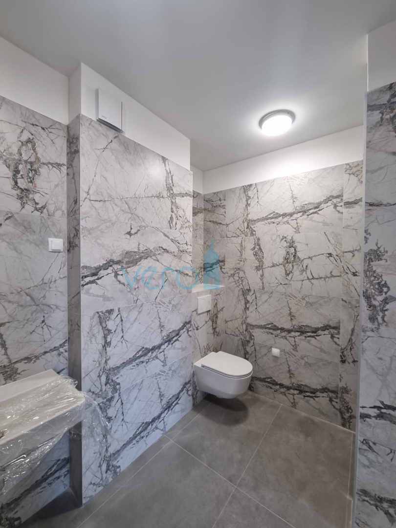 Kostrena, Rijeka area, comfortable three-room apartment, near the sea, ground floor, for sale