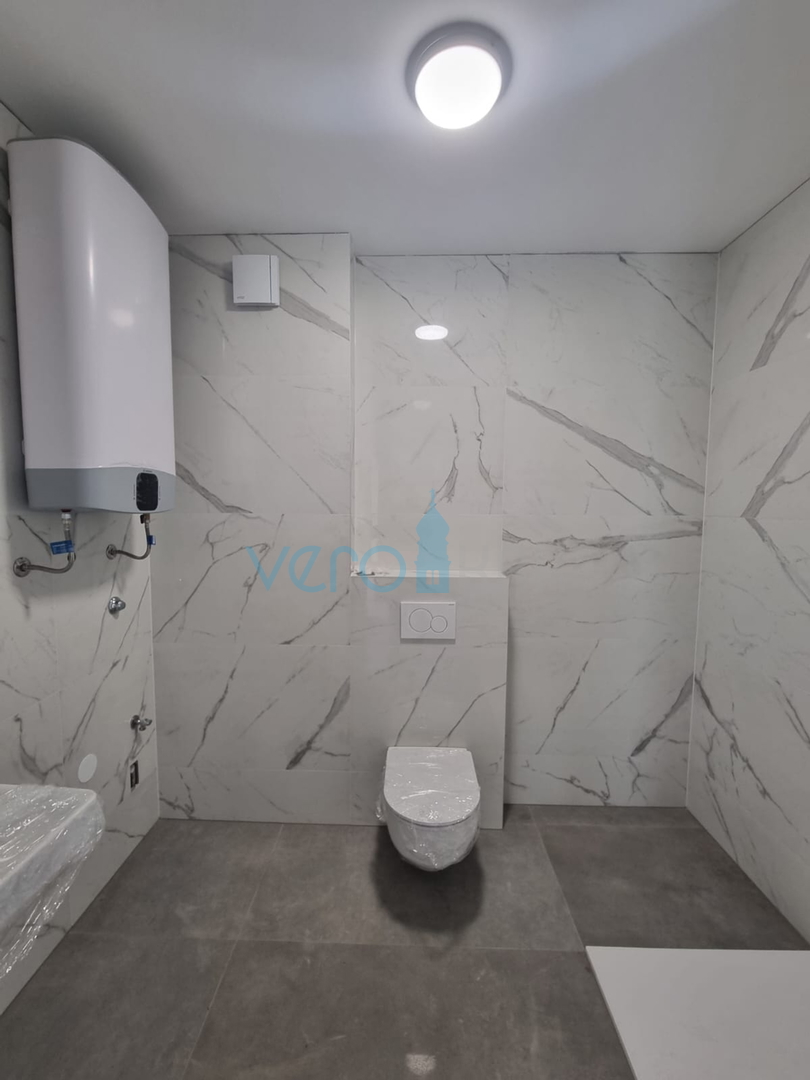 Kostrena, Rijeka area, comfortable three-room apartment, near the sea, ground floor, for sale