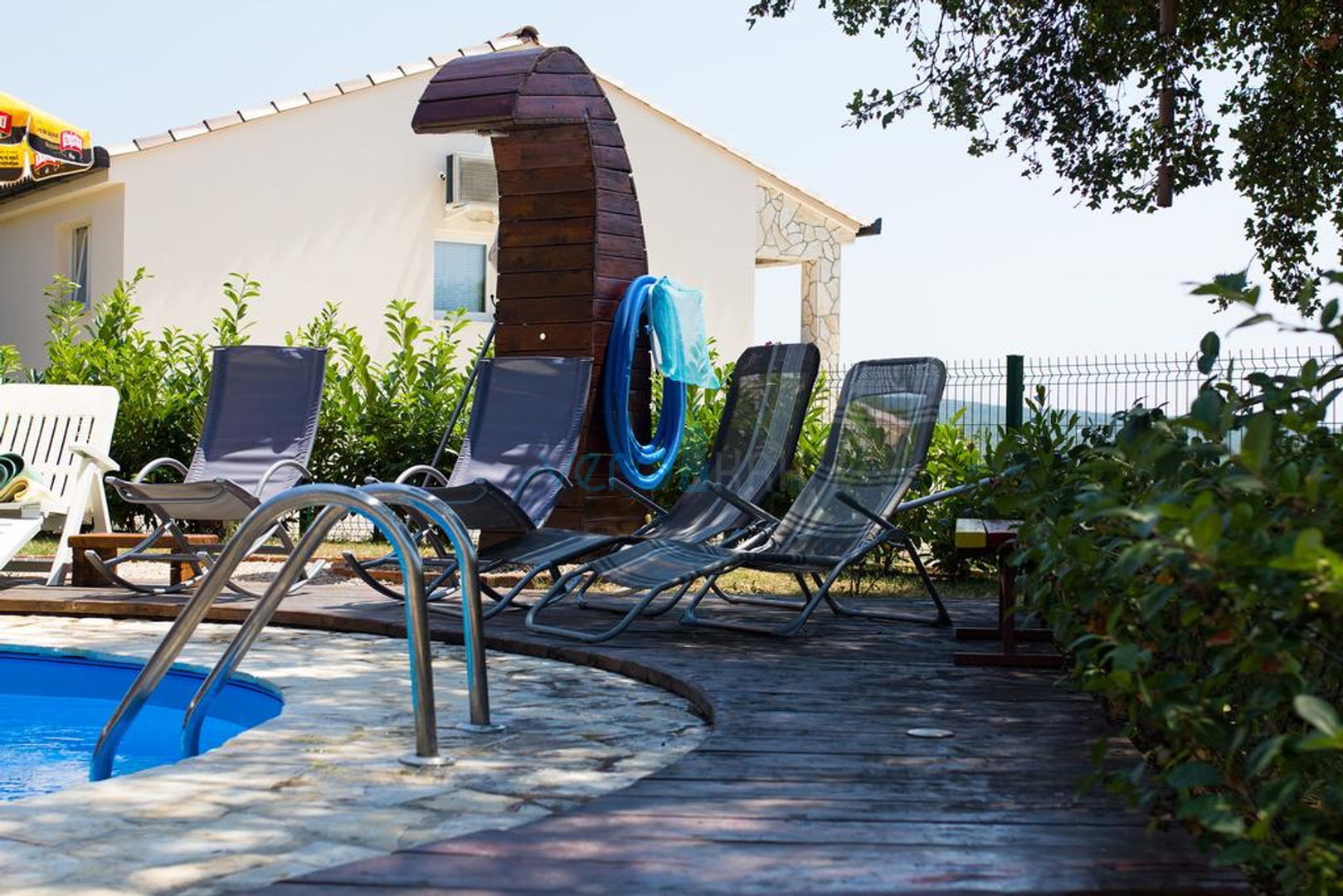 Island of Krk, surroundings, house with two apartments, swimming pool and sea view, for sale