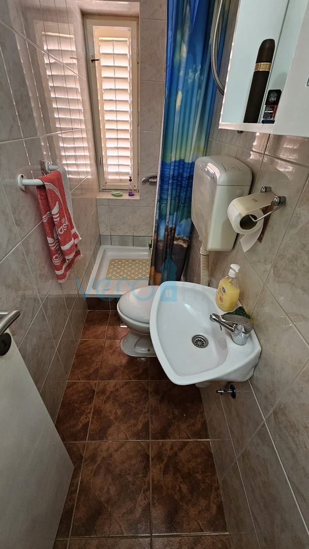 Crikvenica, a floor-through apartment with terraces and garage, 300m to the beach and the center, for sale