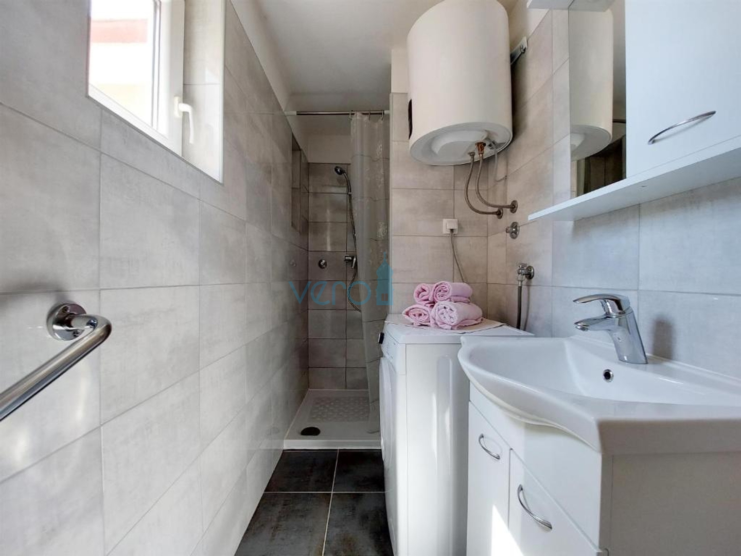 Crikvenica, a floor-through apartment with terraces and garage, 300m to the beach and the center, for sale