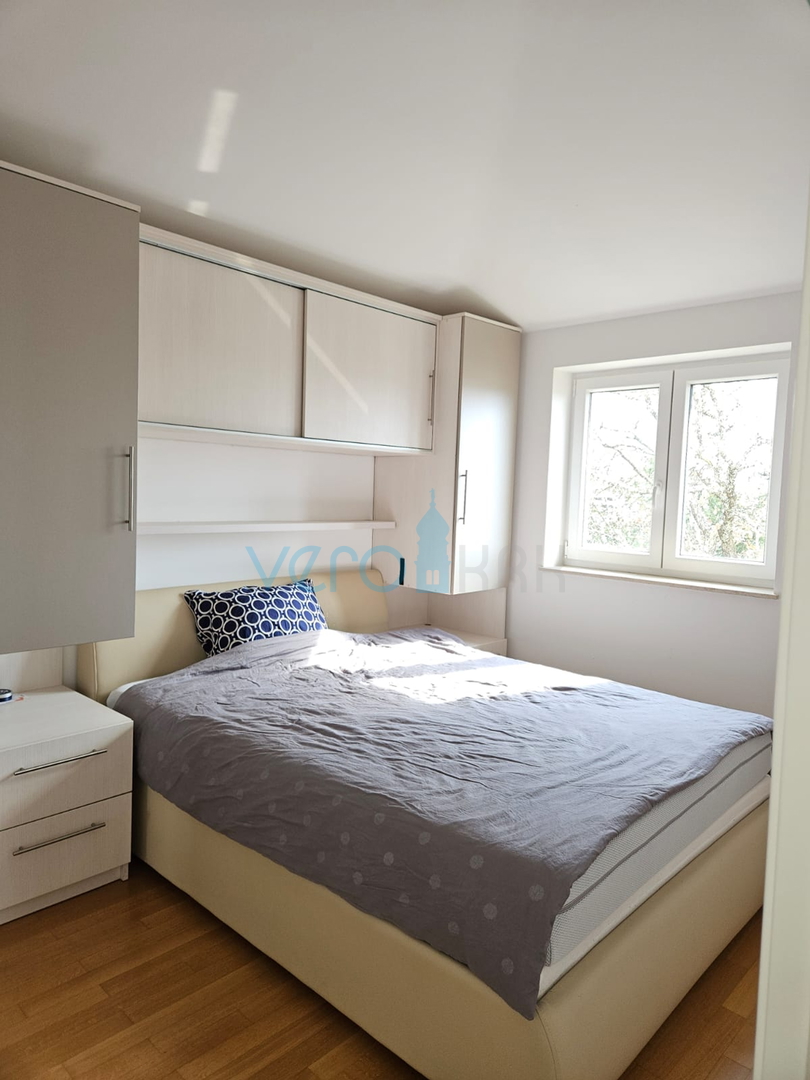 Malinska, near the center, Nice two-story apartment 100 m2 with an open sea view, for sale
