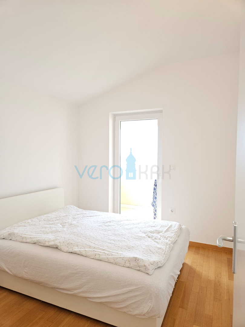 Malinska, near the center, Nice two-story apartment 100 m2 with an open sea view, for sale
