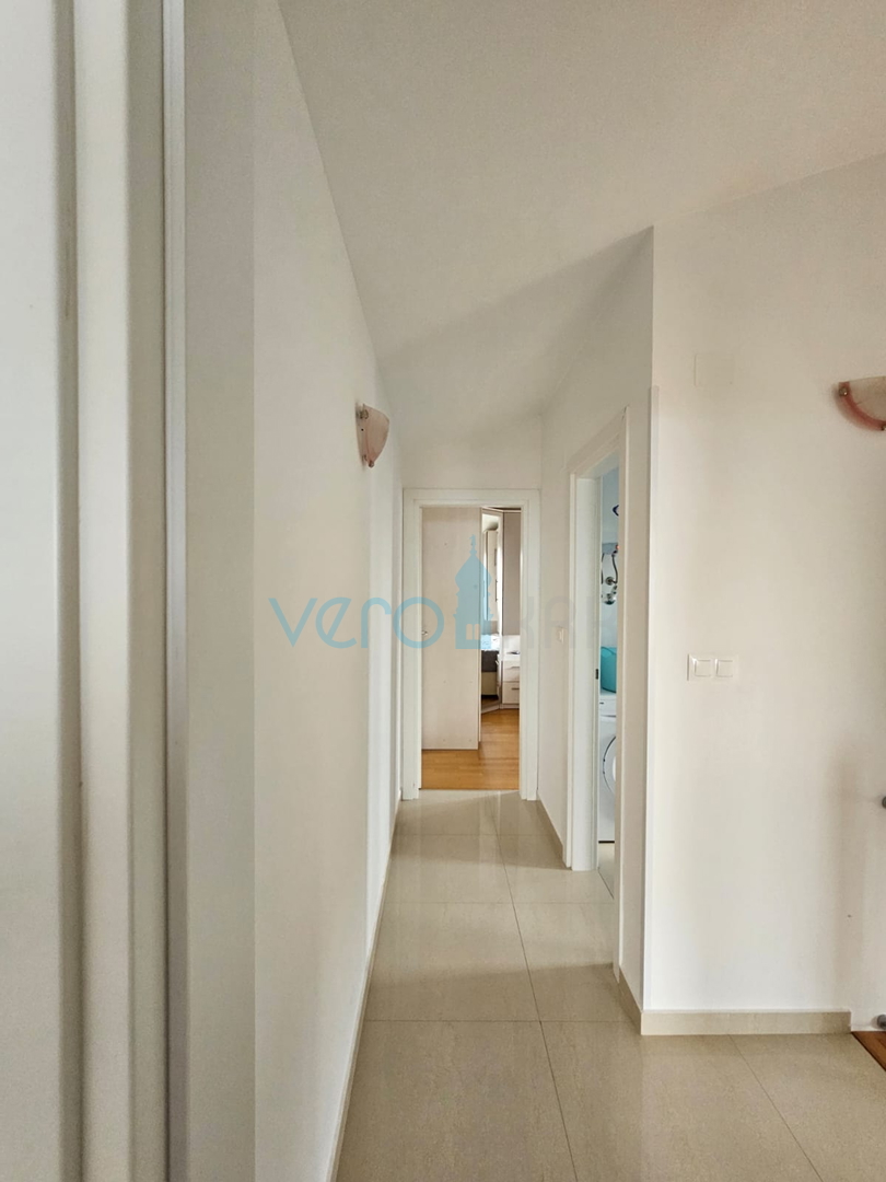 Malinska, near the center, Nice two-story apartment 100 m2 with an open sea view, for sale