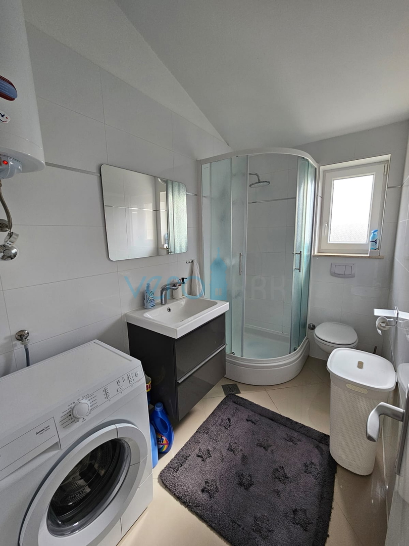 Malinska, near the center, Nice two-story apartment 100 m2 with an open sea view, for sale