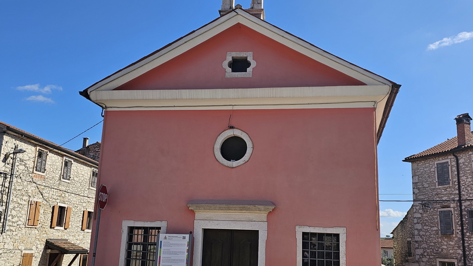 Residential building land with a sea view in Brtonigla