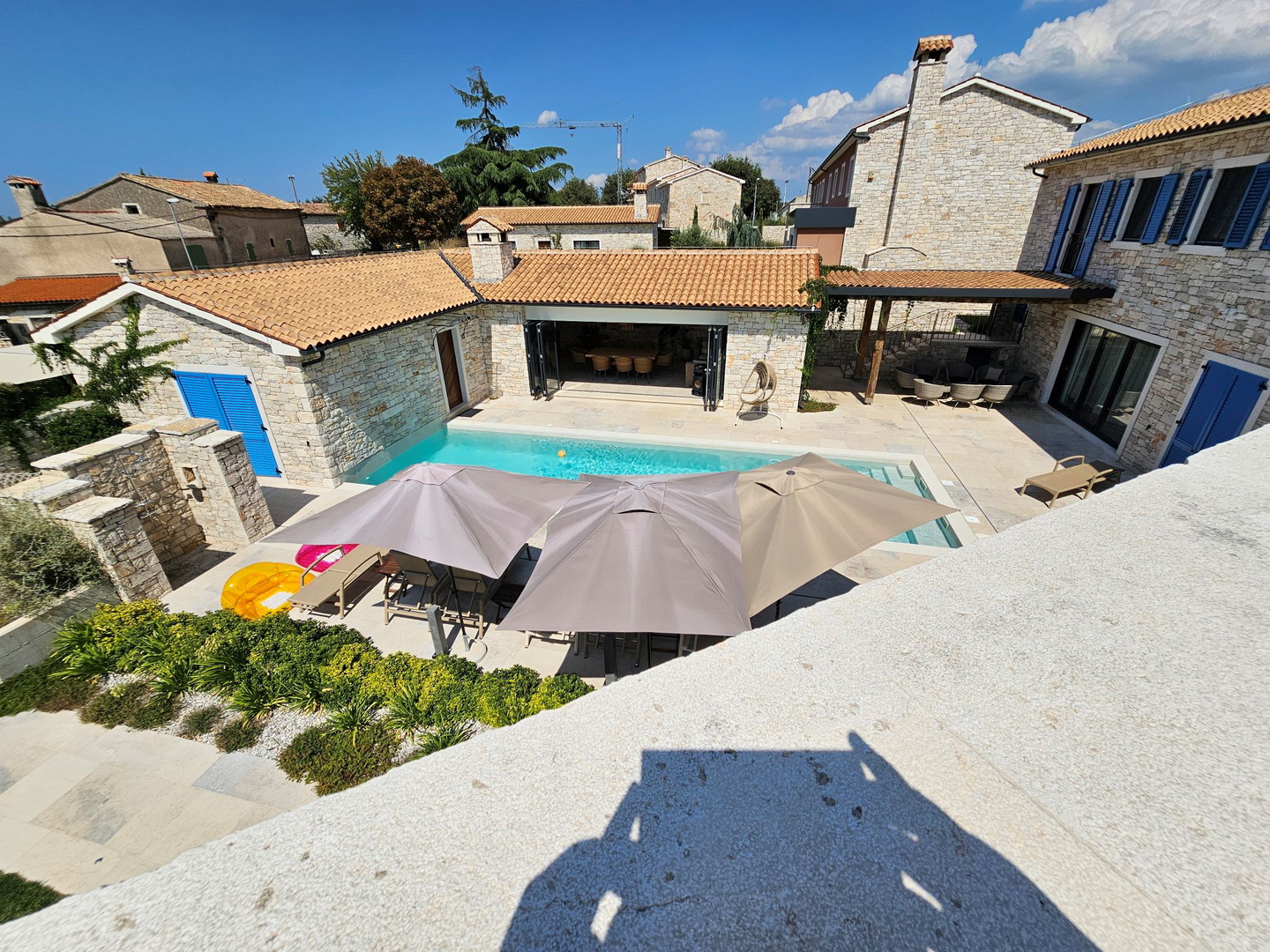 Luxury villas with an open view of the sea, a yard and two swimming pools