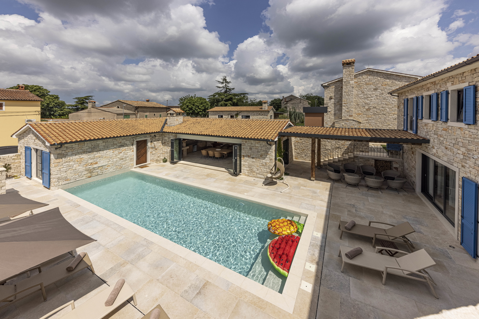 Luxury villas with an open view of the sea, a yard and two swimming pools