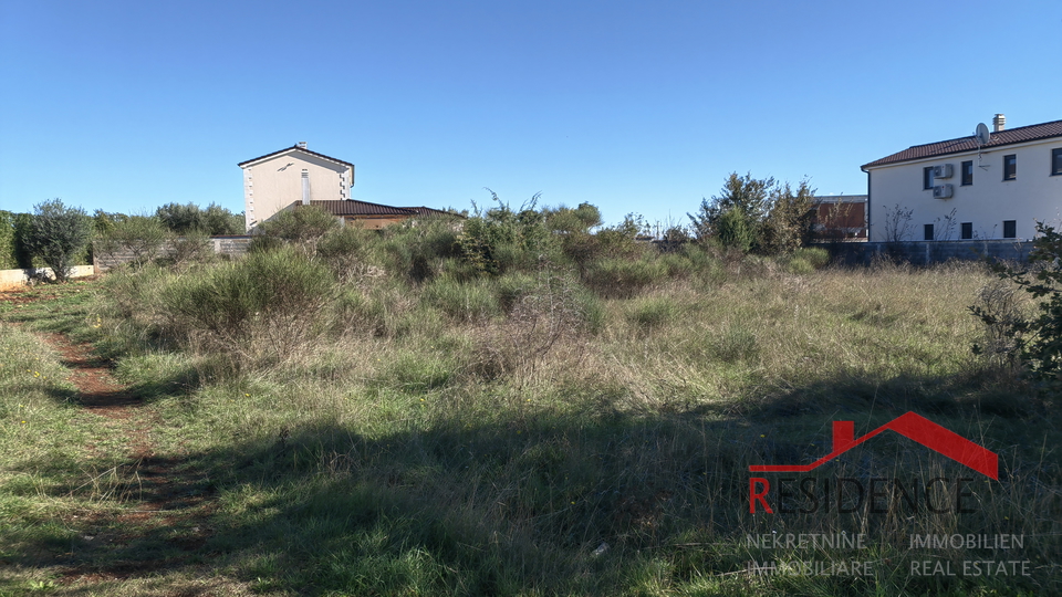 Radeki polje, building land next to asphalt