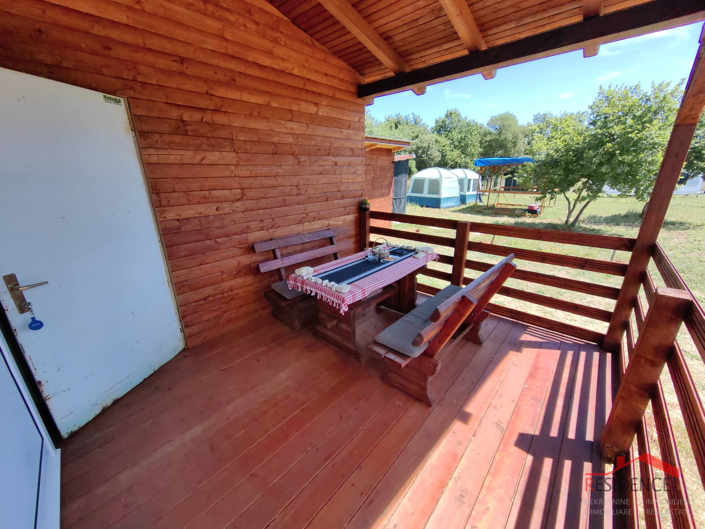Agricultural land in Šišan with a weekend house