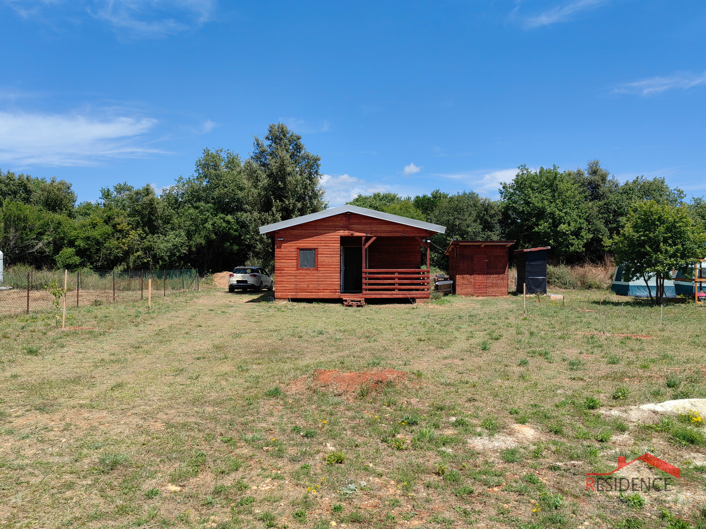 Agricultural land in Šišan with a weekend house