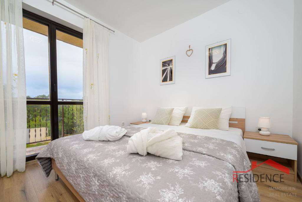 Prostrana kuća s 7 apartmana i velikim vrtom u Štinjanu