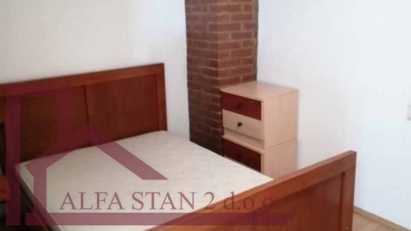 Renovated stone house with two bedrooms and a yard