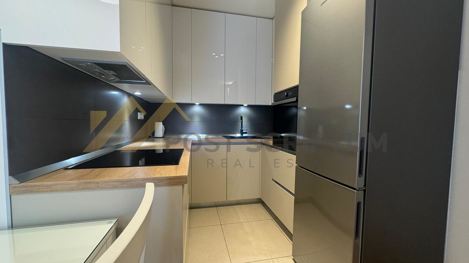 KMAN&comma; NOVOGRADNJA S PARKING MJESTOM U GARA&Zcaron;I