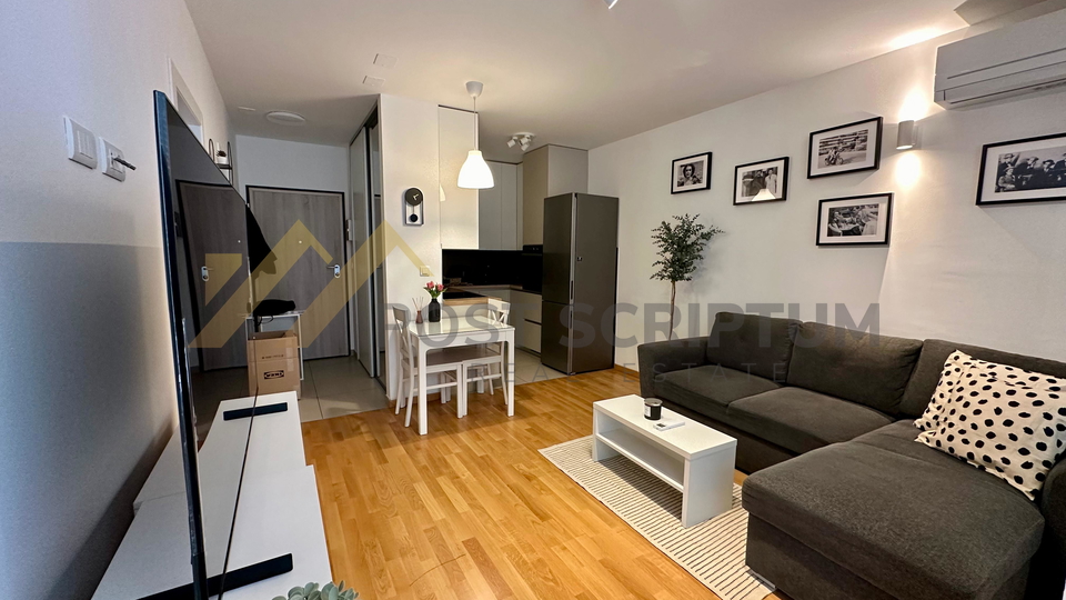 KMAN&comma; NOVOGRADNJA S PARKING MJESTOM U GARA&Zcaron;I