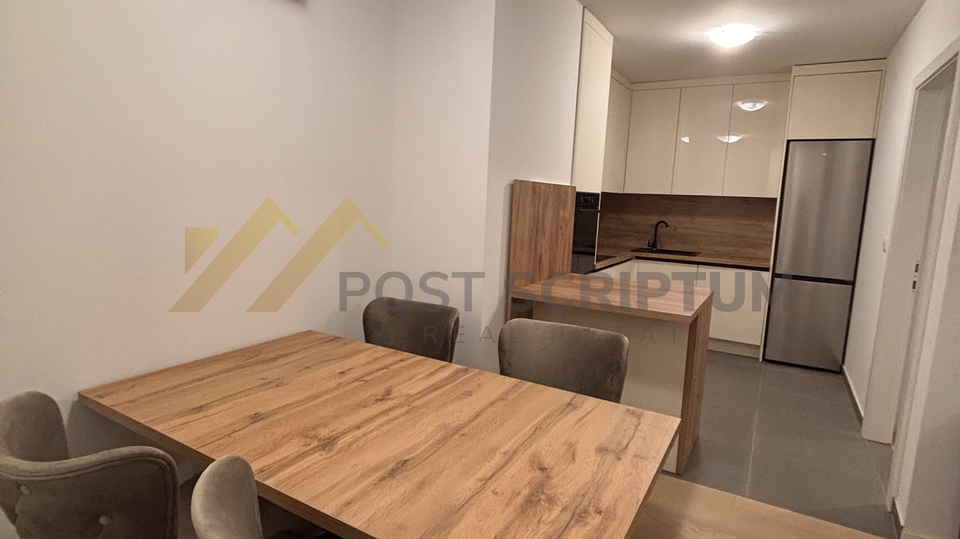 ŽNJAN, DVOSOBAN, PARKING MJESTO U GARAŽI OBJEKTA, PRVO USELJENJE