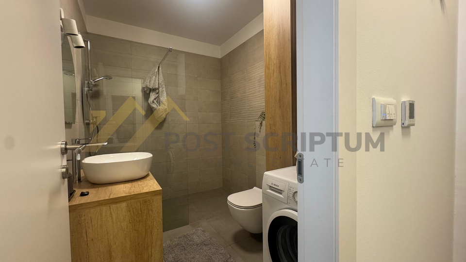 KMAN&comma; NOVOGRADNJA S PARKING MJESTOM U GARA&Zcaron;I