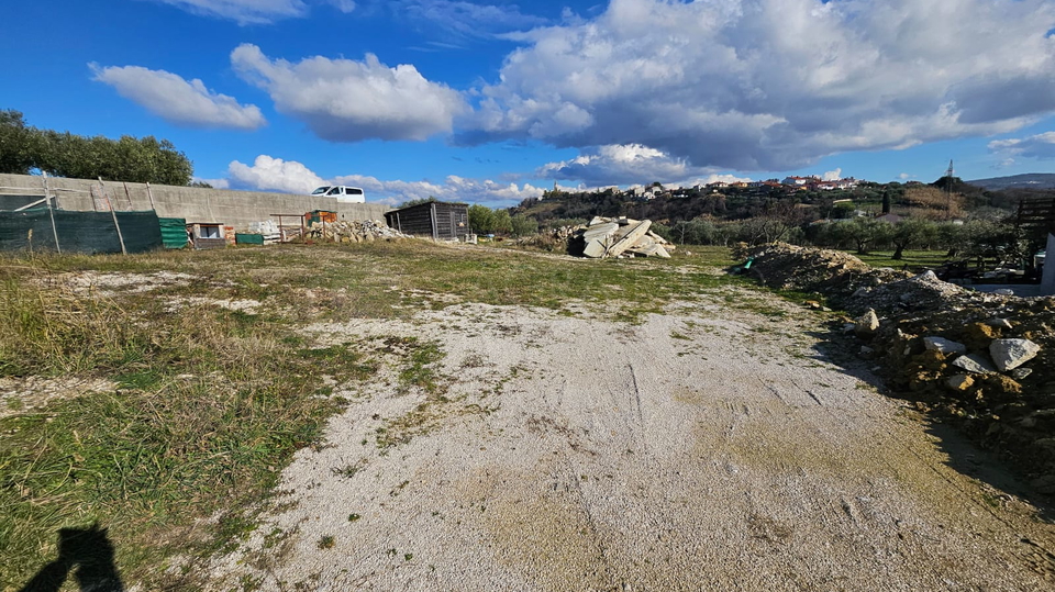 BUJE &ndash; BUILDING PLOT WITH ISSUED BUILDING PERMIT AND STUNNING SEA VIEW &ndash; IMMEDIATE CONSTRUCTION  A rare and highly attractive