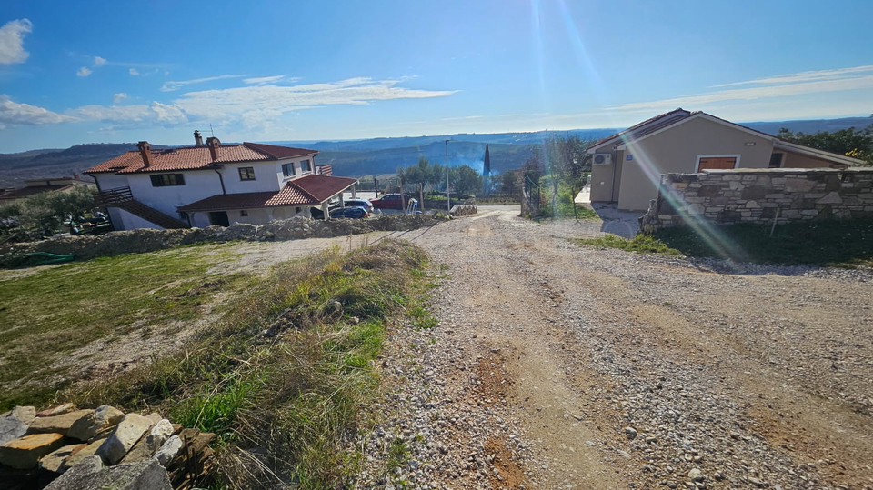 BUJE &ndash; BUILDING PLOT WITH ISSUED BUILDING PERMIT AND STUNNING SEA VIEW &ndash; IMMEDIATE CONSTRUCTION  A rare and highly attractive