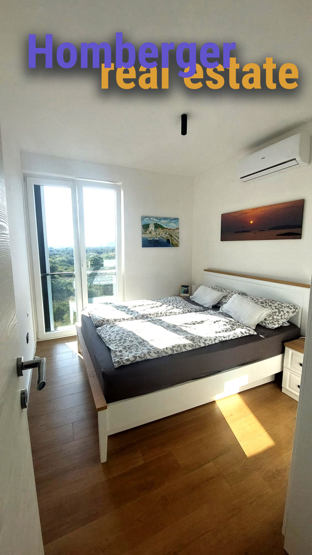 Atraktivan stan u poslovnom prostoru samo 60m do mora -pogled na more