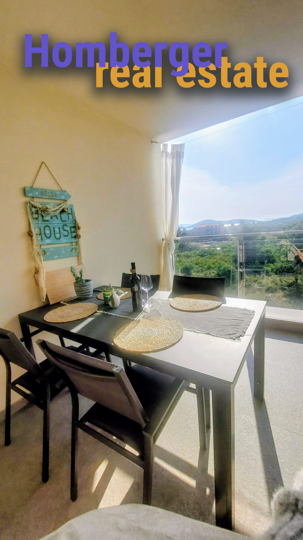 Atraktivan stan u poslovnom prostoru samo 60m do mora -pogled na more