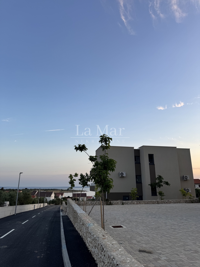 EKSKLUZIVNO! Novogradnja u Novalji s pogledom na more -S2- 76,12 m2 - I kat