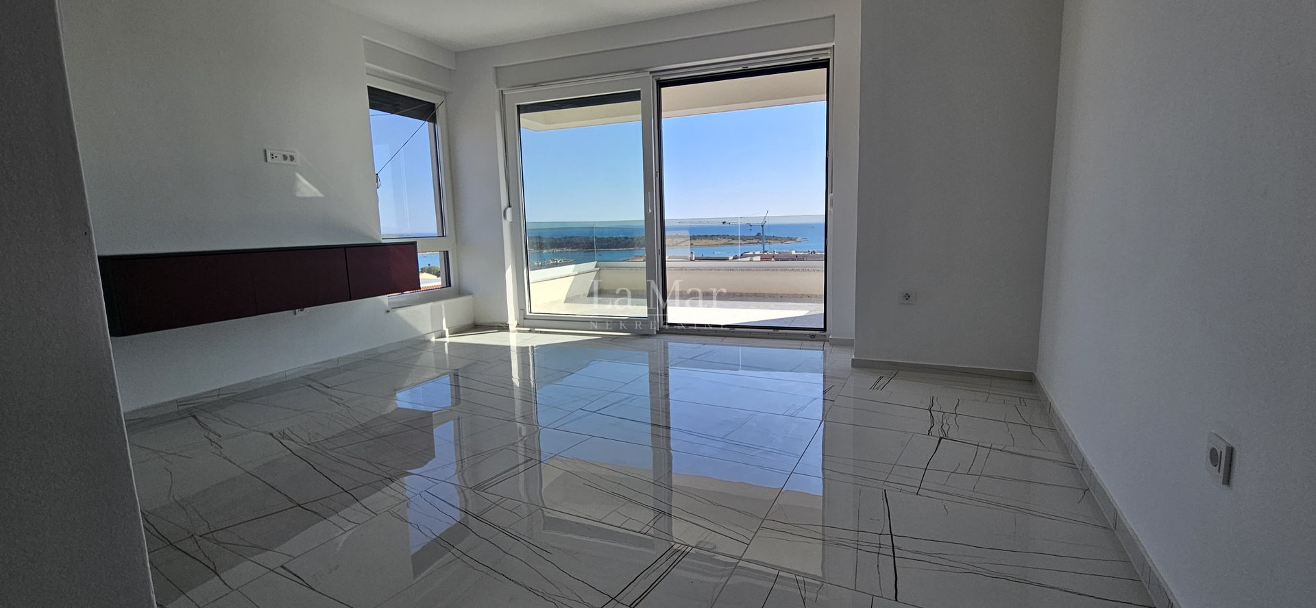 Novalja- namještena NOVOGRADNJA s pogledom na more - A2 - I. kat-  68,3 m2 - 260.000€