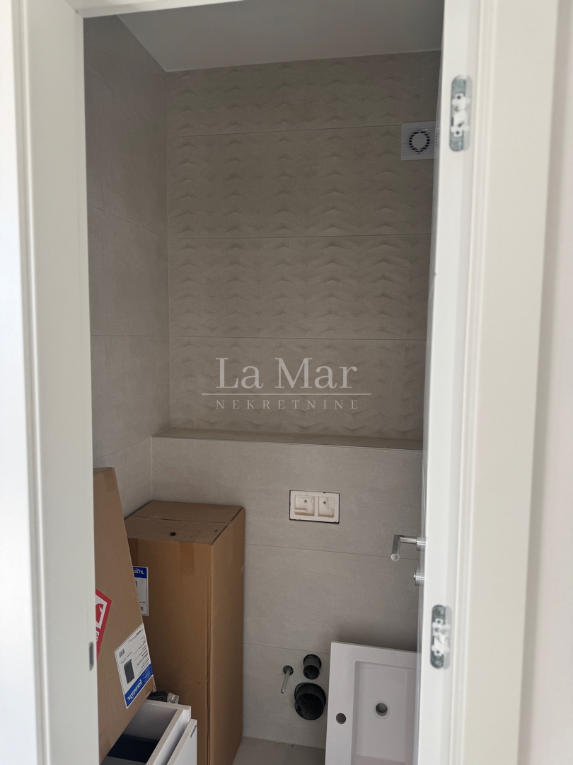 Novalja - Vrhunska novogradnja s pogledom na more - 79,33m2 - prizemlje