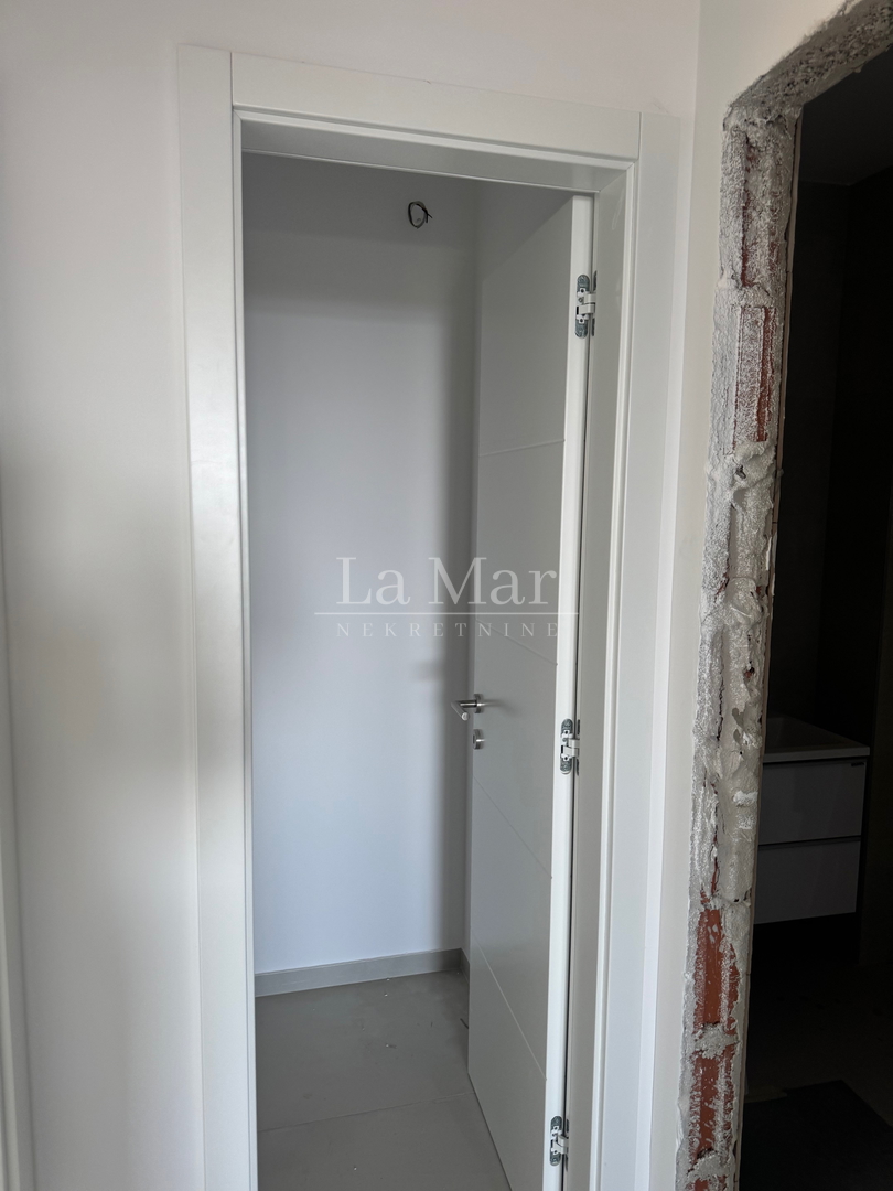 EKSKLUZIVNO! Novogradnja u Novalji s pogledom na more -S2- 76,12 m2 - I kat