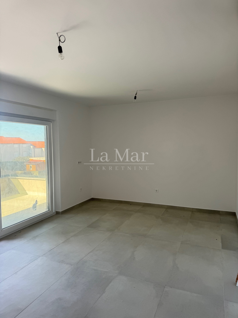 EKSKLUZIVNO! Novogradnja u Novalji s pogledom na more -S2- 76,12 m2 - I kat